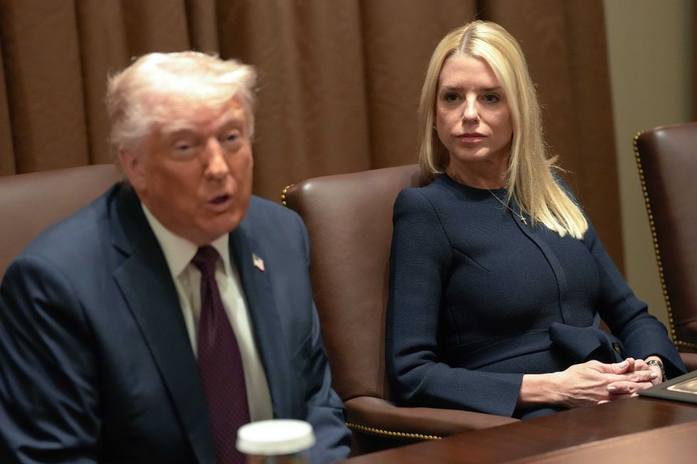 U.S. Attorney General Pam Bondi looks on as President Donald Trump delivers remarks during a cabinet meeting at the White House on March 24, 2025