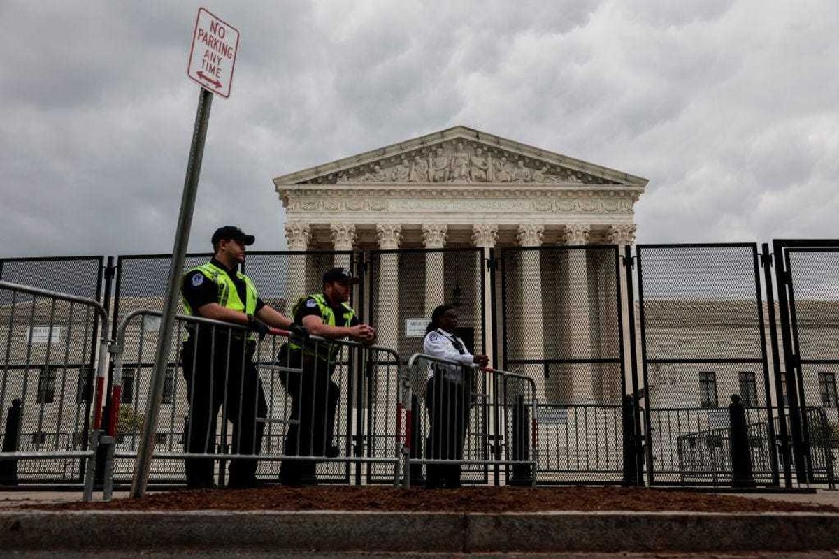 U.S. Capitol Police officers observe an abortion rights rally in front of the U.S. Supreme Court building on May 05, 2022 in Washington, DC.