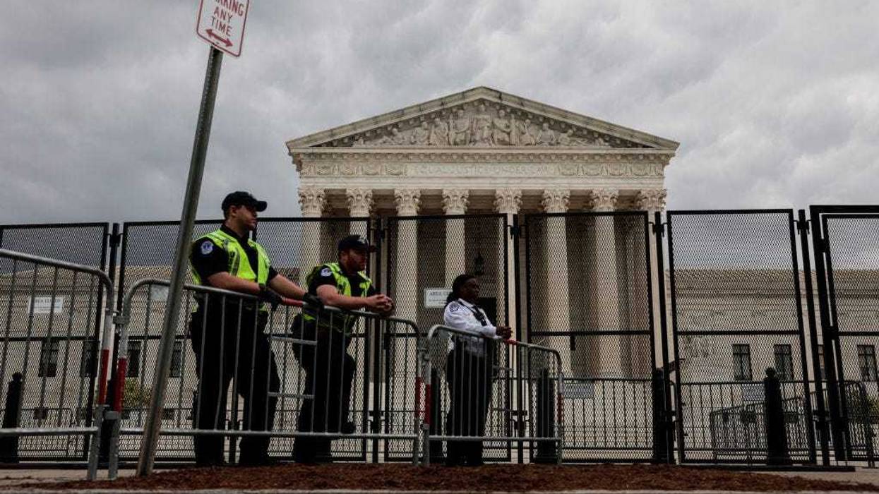 U.S. Capitol Police officers observe an abortion rights rally in front of the U.S. Supreme Court building on May 05, 2022 in Washington, DC.