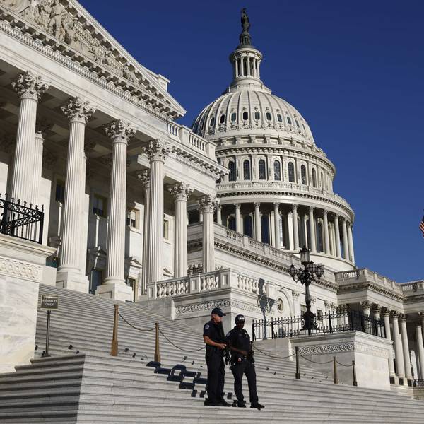 U.S. Capitol Police officers stand guard on the House steps at the U.S. Capitol in Washington, D.C., U.S., on Friday, Oct. 1, 2021.