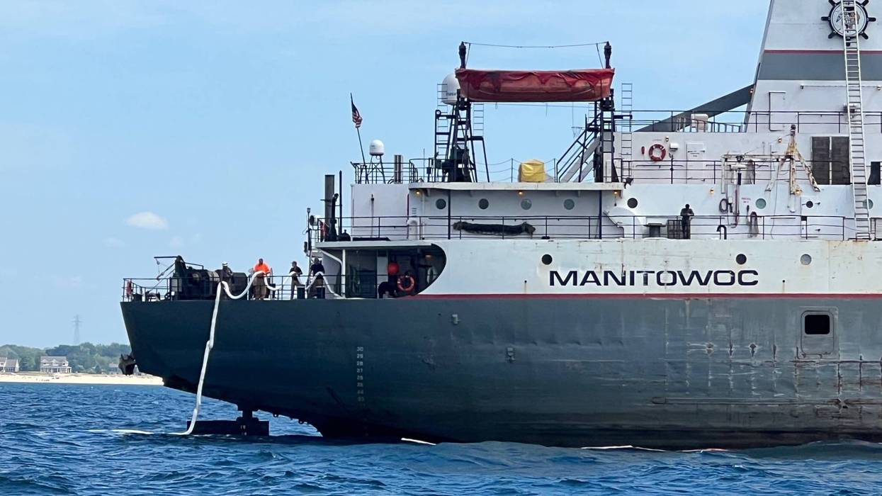 U.S. Coast Guard personnel, along with state and local agencies, are responding to an oil spill in Lake Michigan after a freighter discovered a hole in its hull on Wednesday.