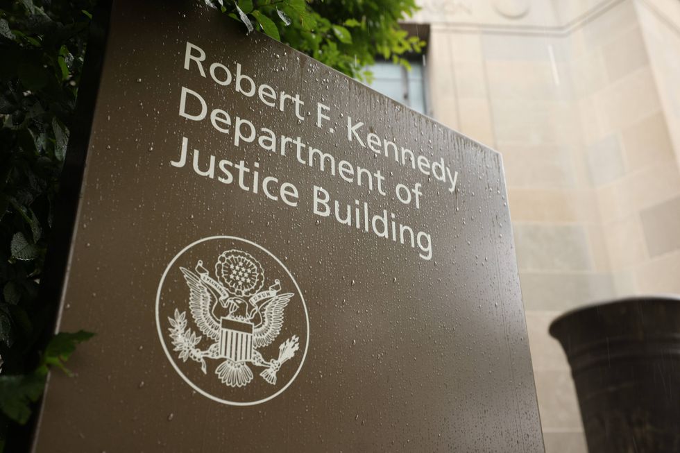 U.S. Department of Justice sign.