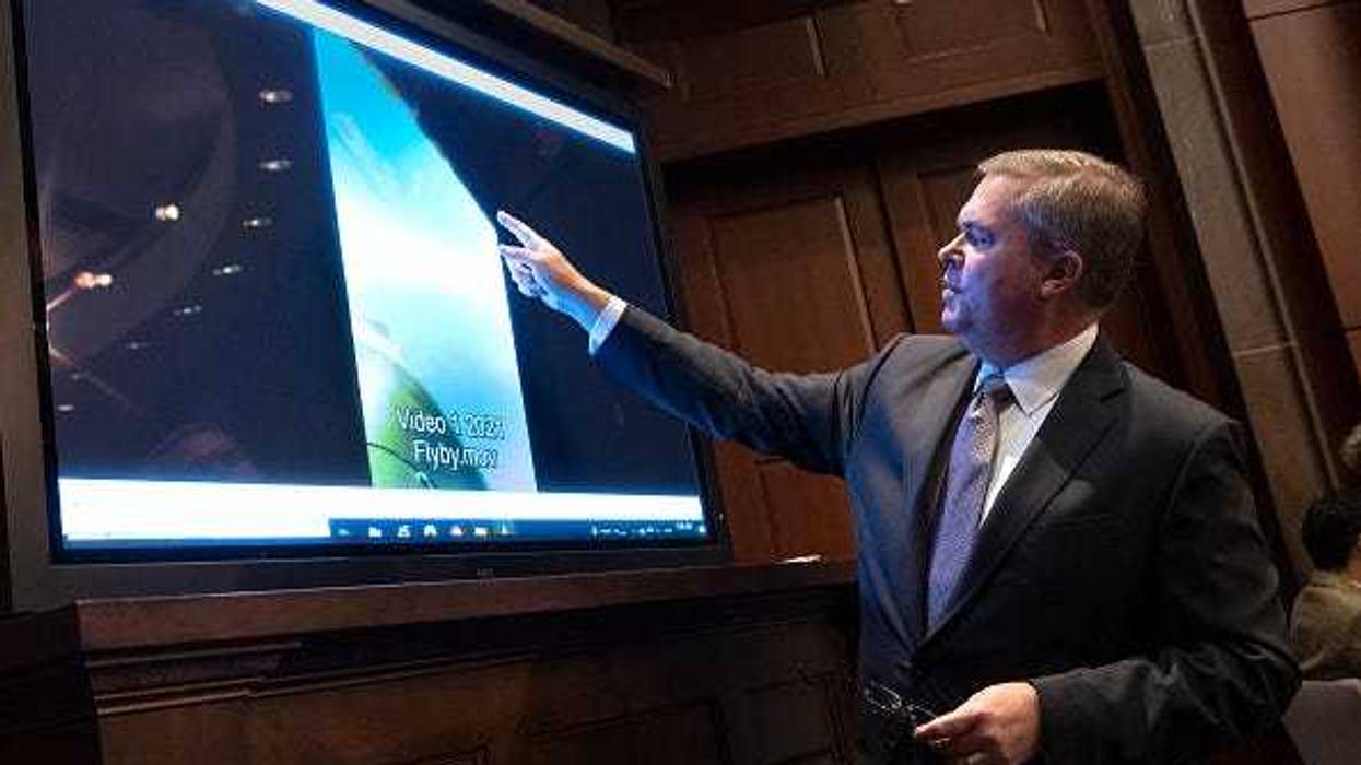 U.S. Deputy Director of Naval Intelligence Scott Bray explains a video of an unidentified aerial phenomena, as he testifies before a House Intelligence Committee subcommittee hearing at the U.S. Capitol on May 17, 2022 in Washington, DC.