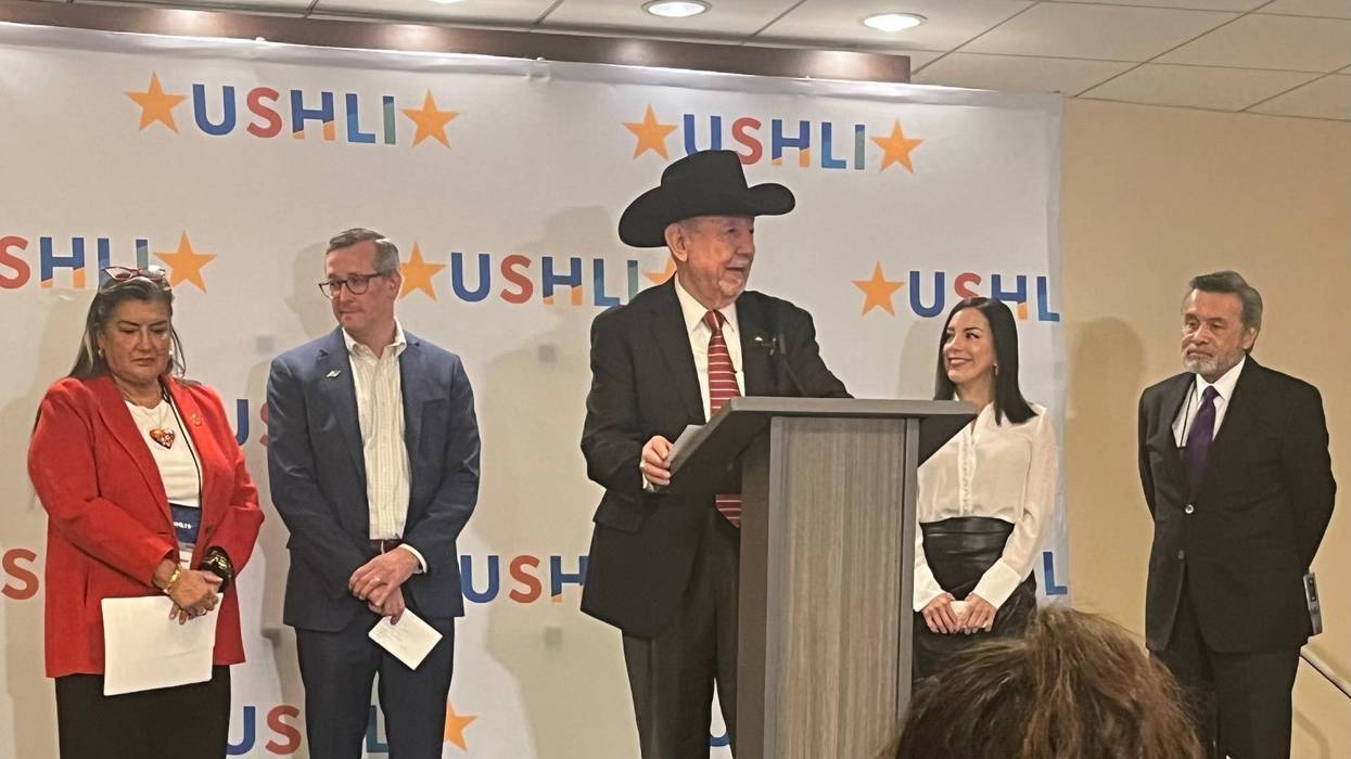 U.S. Hispanic Leadership Institute president Dr. Juan Andrade (center) speaks at the Sheraton Grand Chicago Riverwalk, 301 E. North Water St.