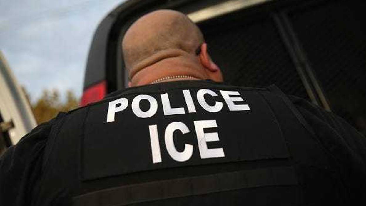 U.S. Immigration and Customs Enforcement (ICE), agents detain an undocumented immigrant in Los Angeles, California.