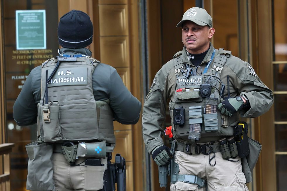 U.S. law enforcement officials stand guard outside of Daniel Patrick Moynihan United States Courthouse for the arraignment of President of Venezuela Nicolas Maduro and first lady Cilia Flores on Jan. 5, 2026