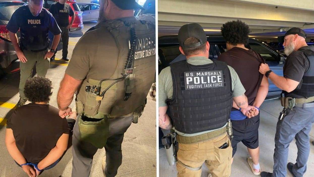 U.S. Marshals apprehend Shawn Moir in a parking garage on the Villanova University campus, on Wednesday, Aug. 27. Moir is charged with homicide in the death of his grandfather.