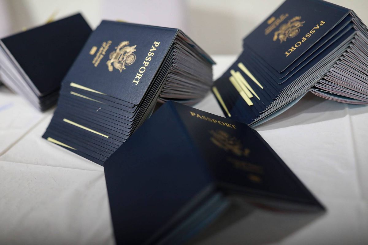 U.S. passport books being processed.