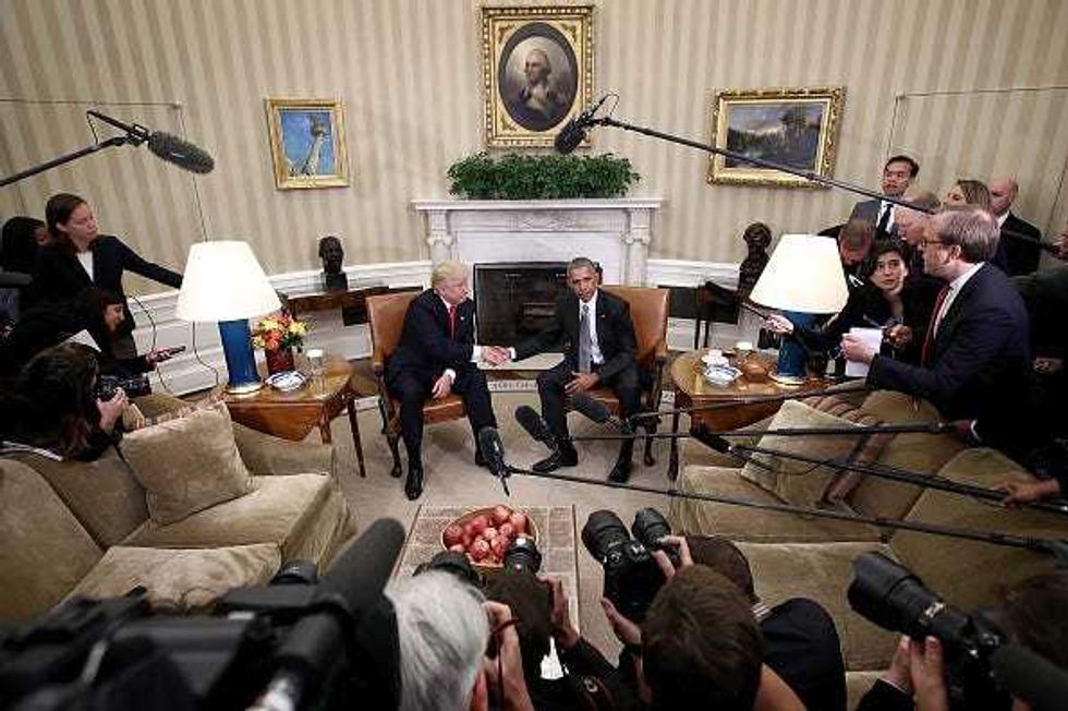 U.S. President Barack Obama (R) shakes hands with President-elect Donald Trump (L) following a meeting in the Oval Office November 10, 2016 in Washington, DC. Trump is scheduled to meet with members of the Republican leadership in Congress later today on Capitol Hill. (Photo by Win McNamee/Getty Images)