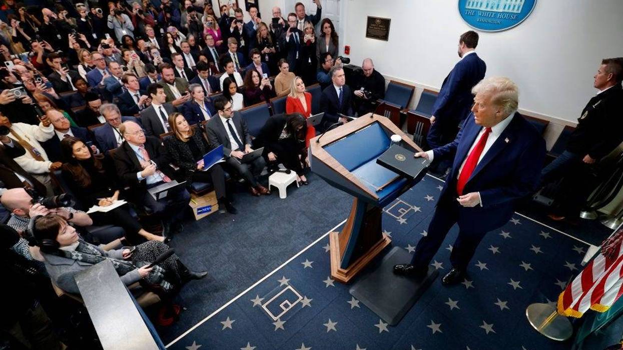 U.S. President Donald Trump arrives for a press conference about the collision of an American Airlines flight with a military helicopter near Ronald Reagan National Airport