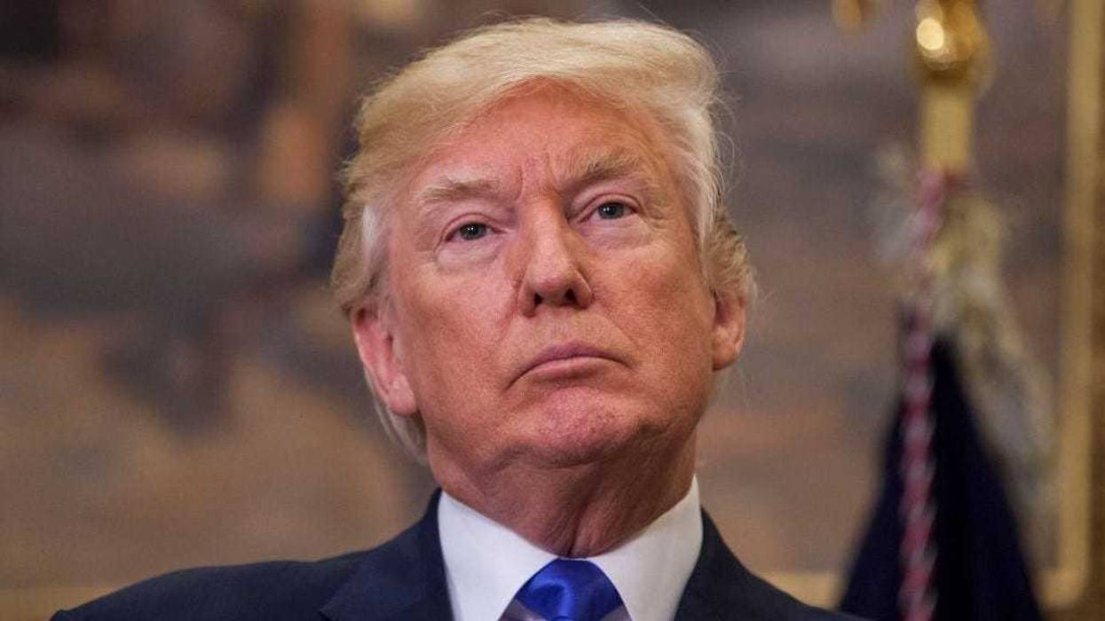 U.S. President Donald Trump attends the announcement of the introduction of the Reforming American Immigration for a Strong Economy (RAISE) Act in the Roosevelt Room at the White House on August 2, 2017 in Washington, DC.