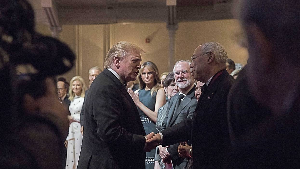 U.S. President Donald Trump, center left, shakes hands with Colin Powell, former U.S. secretary of state, during the Ford's Theatre Gala in Washington, D.C., U.S., on Sunday, June 2, 2019.