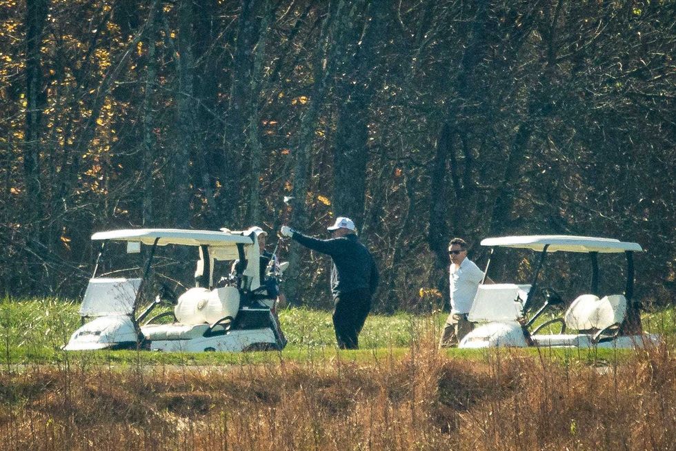 U.S. President Donald Trump golfs at Trump National Golf Club, on November 7, 2020 in Sterling, Virginia. News outlets projected that Democratic nominee Joe Biden will be the 46th president of the United States after a victory in Pennsylvania.