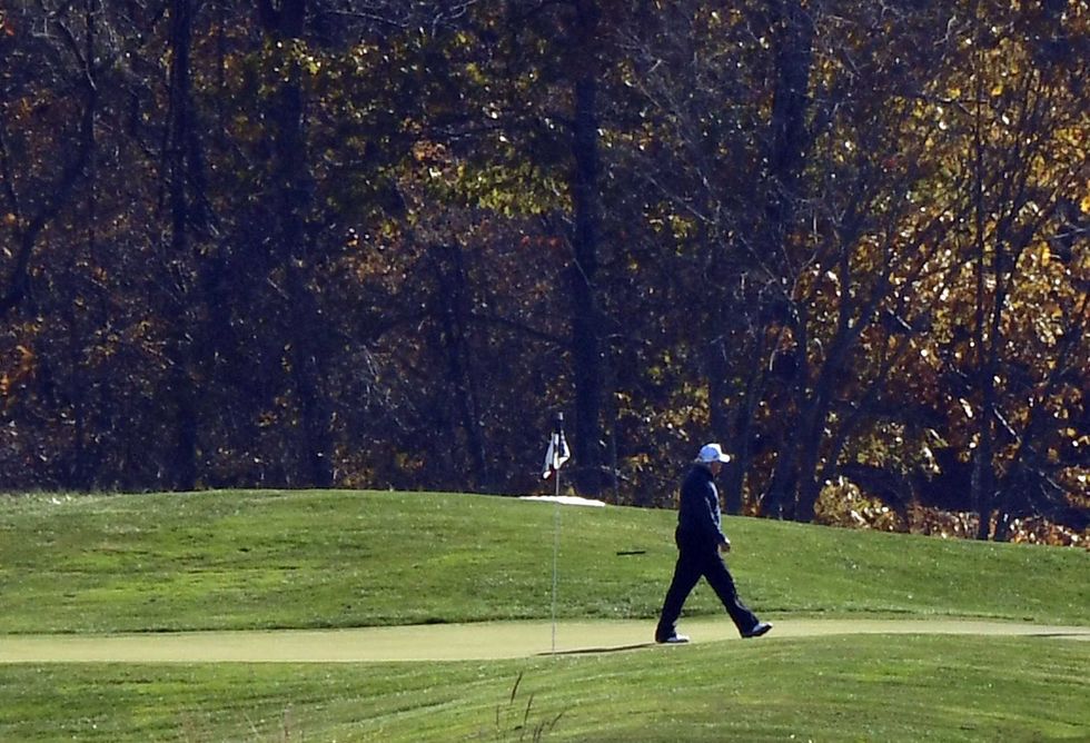 U.S. President Donald Trump golfs at Trump National Golf Club, on November 7, 2020 in Sterling, Virginia. News outlets projected that Democratic nominee Joe Biden will be the 46th president of the United States after a victory in Pennsylvania.