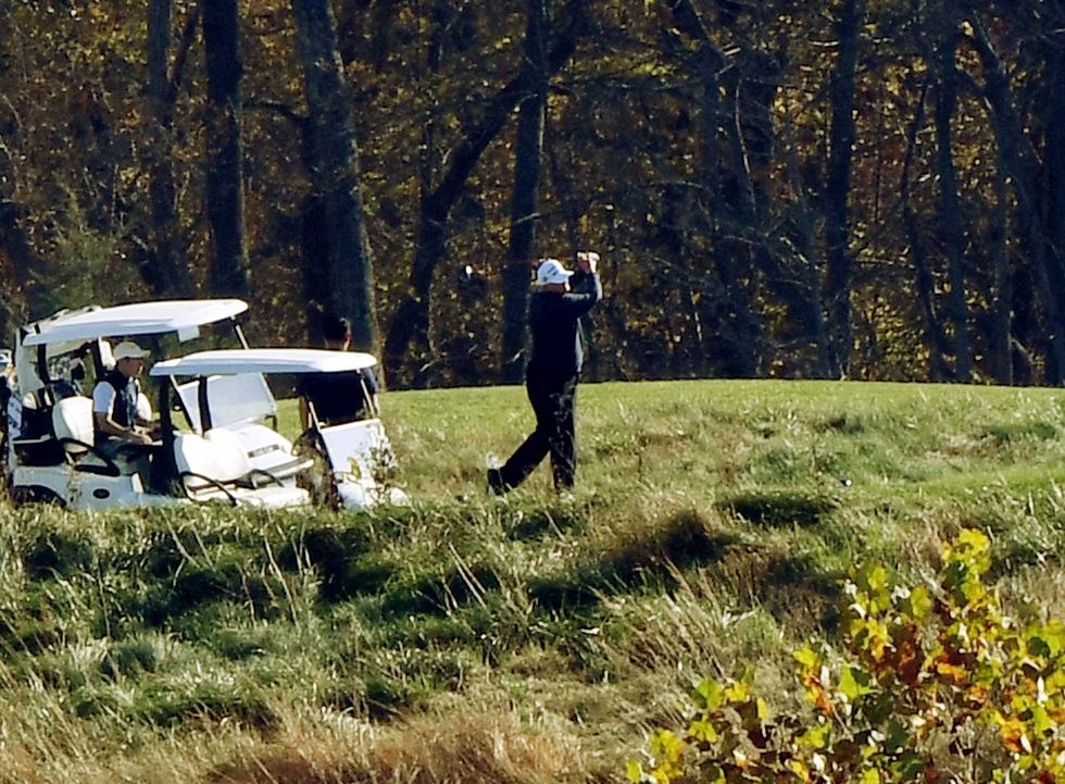 U.S. President Donald Trump golfs at Trump National Golf Club, on November 7, 2020 in Sterling, Virginia. News outlets projected that Democratic nominee Joe Biden will be the 46th president of the United States after a victory in Pennsylvania.