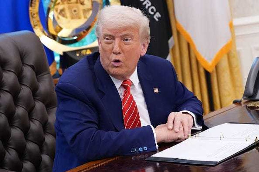 U.S. President Donald Trump, joined by Tesla CEO Elon Musk, speaks to reporters in the Oval Office of the White House on May 30, 2025 in Washington, DC. Musk, who served as an adviser to Trump and led the Department of Government Efficiency, announced he would leave the Trump administration to refocus on his businesses. (Photo by Kevin Dietsch/Getty Images)