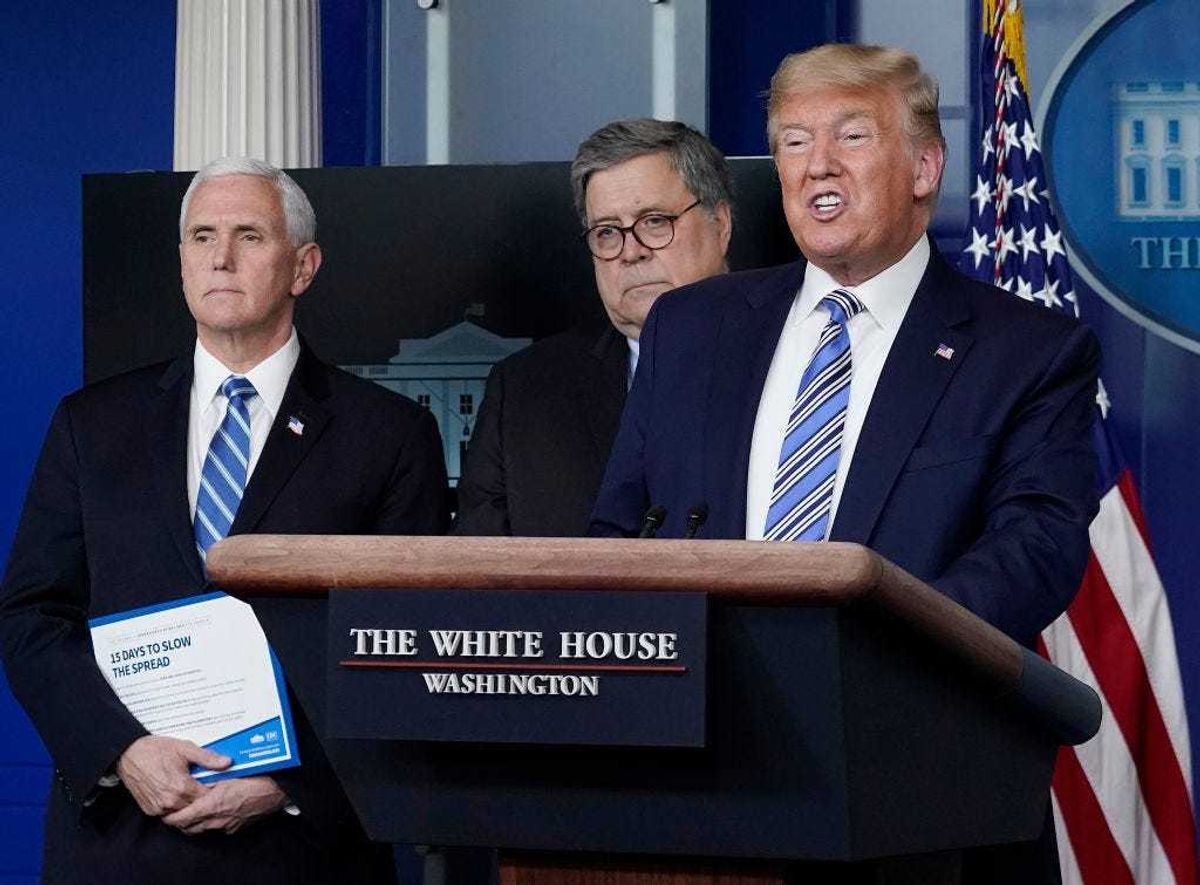 U.S. President Donald Trump, joined by Vice President Mike Pence and Attorney General Bill Barr, speaks at the daily coronavirus briefing at the White House on March 23, 2020 in Washington, DC.