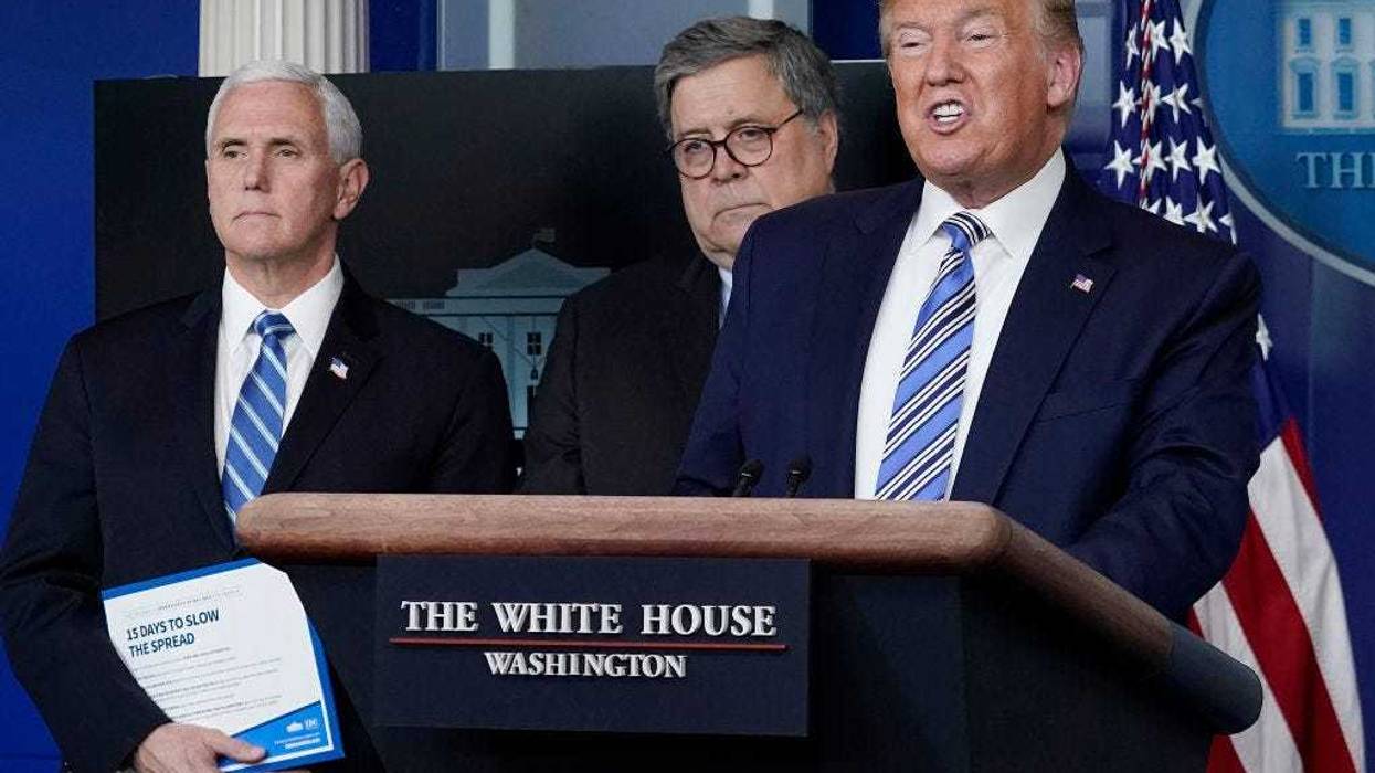 U.S. President Donald Trump, joined by Vice President Mike Pence and Attorney General Bill Barr, speaks at the daily coronavirus briefing at the White House on March 23, 2020 in Washington, DC.