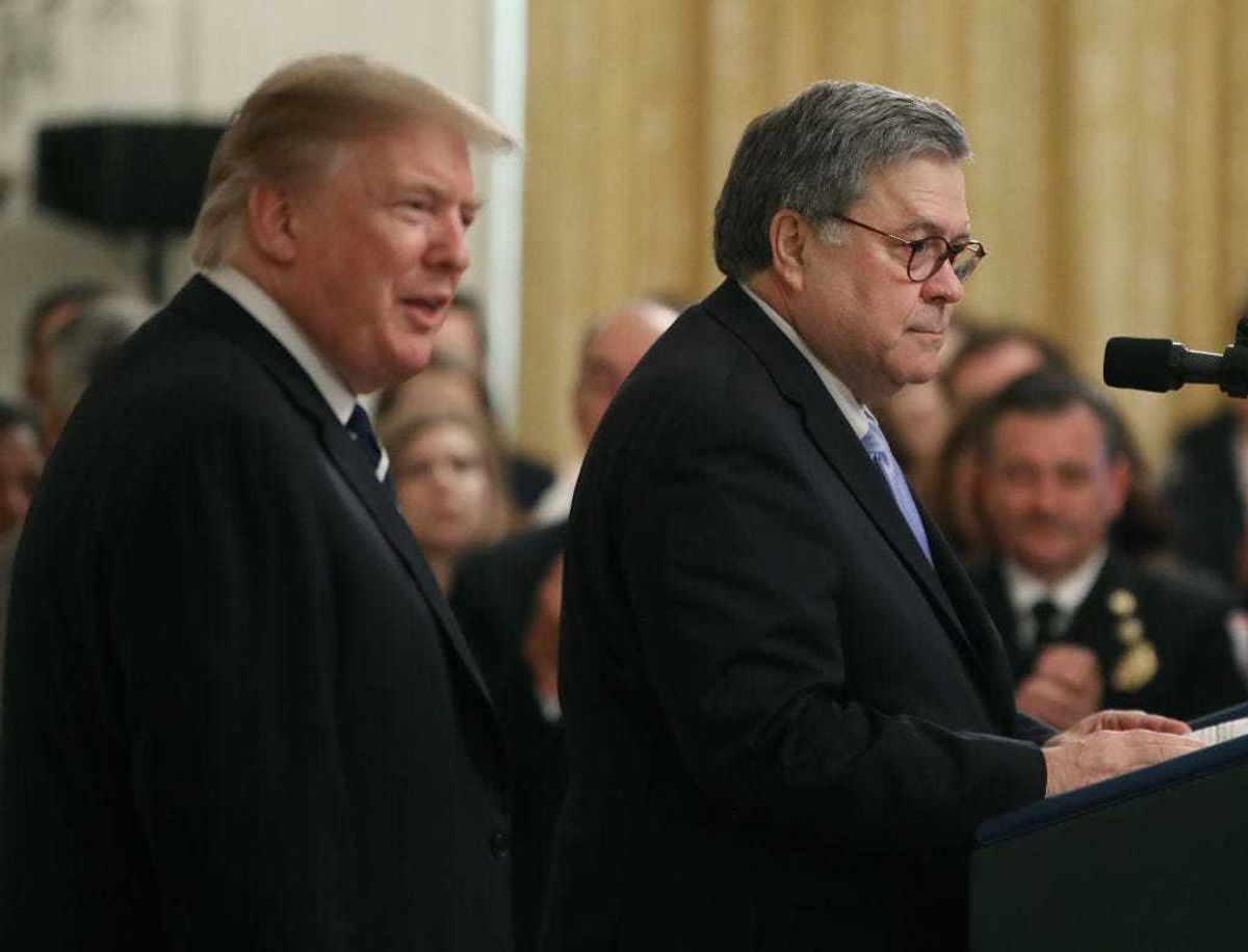 U.S. President Donald Trump (L) stands with Attorney General William Barr before the presentation of the Public Safety Officer Medals of Valor in the East Room of the White House May 22, 2019 in Washington, DC.