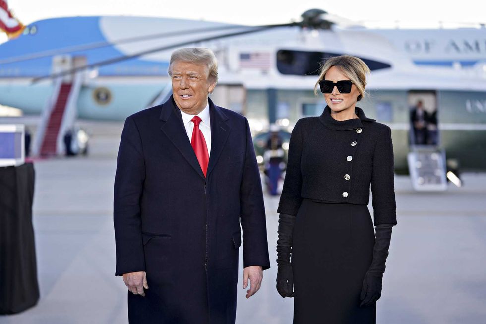 U.S. President Donald Trump, left, and U.S. First Lady Melania Trump arrive to a farewell ceremony at Joint Base Andrews, Maryland, U.S., on Wednesday, Jan. 20, 2021.