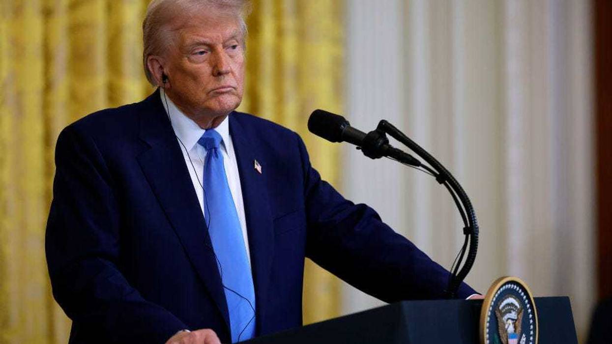 U.S. President Donald Trump listens to a reporter's question during a joint news conference with French President Emmanuel Macron in the East Room of the White House on February 24, 2025 in Washington, DC.