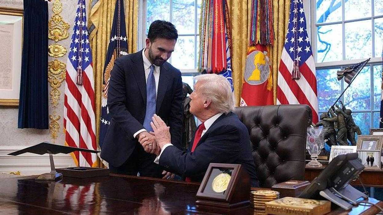 U.S. President Donald Trump shakes hands with New York City Mayor-elect Zohran Mamdani during a meeting in the Oval Office of the White House on November 21, 2025 in Washington, DC.