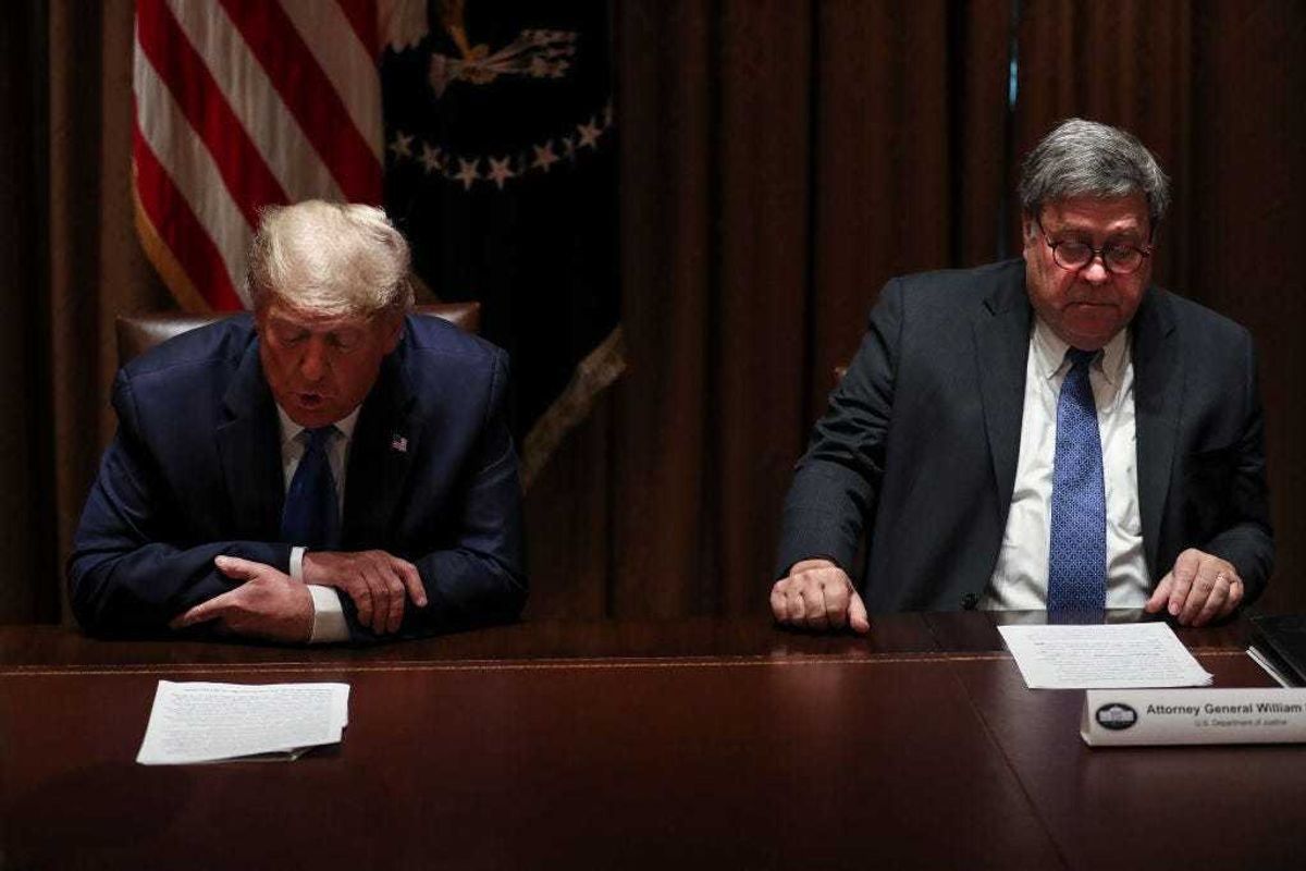 U.S. President Donald Trump speaks as U.S. Attorney General William Barr listens during a discussion with State Attorneys General on Protecting Consumers from Social Media Abuses in the Cabinet Room of the White House on September 23, 2020 in Washington, DC. (Photo by Oliver Contreras-Pool/Getty Images)