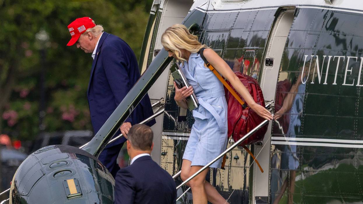 U.S. President Donald Trump steps off Marine One along with Natalie Harp, aide to U.S. President Donald Trump after landing at the Ellipse near the White House on August 16, 2026 in Washington, DC. President Trump spent the weekend at his Bedminster, New Jersey golf club.