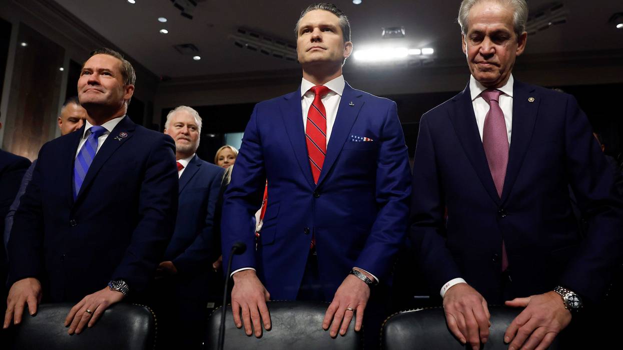 U.S. President-elect Donald Trump's nominee for Secretary of Defense Pete Hegseth arrives for his Senate Armed Services confirmation hearing on Capitol Hill. Hegseth was joined by Rep. Michael Waltz (R-FL) (L) and former Senator Norm Coleman (R-MN).