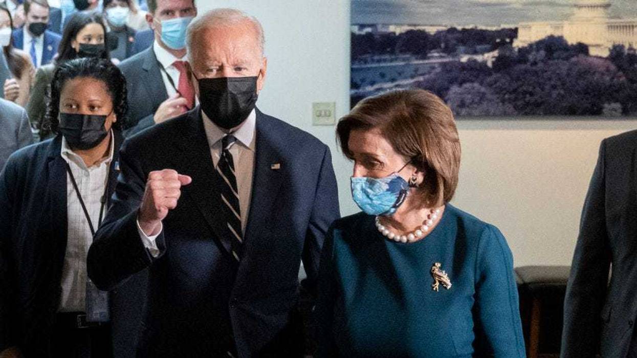 U.S. President Joe Biden and Speaker of the House Nancy Pelosi leave a meeting with House Democrats at the U.S. Capitol on Capitol Hill October 28, 2021 in Washington, DC. President Biden will meet with House Democrats on Thursday morning to try and secure a vote on the Senate-passed bipartisan infrastructure bill and discuss his multi-trillion social policy spending bill. (Photo by Drew Angerer/Getty Images)