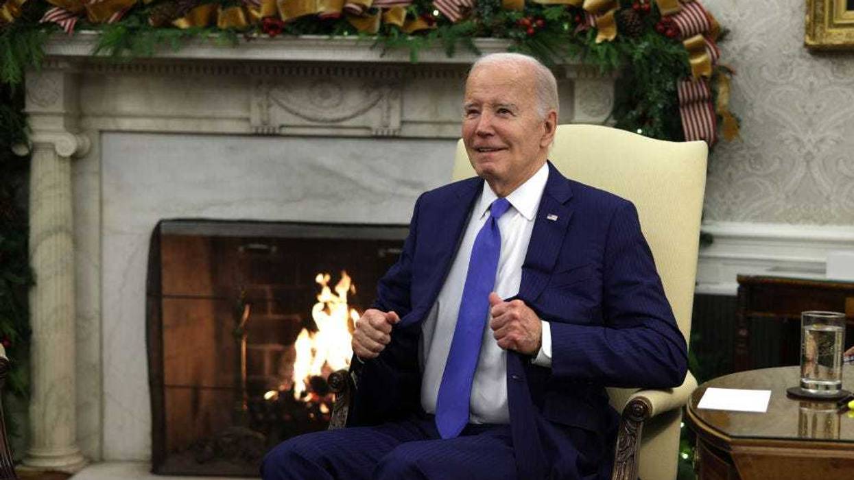 U.S. President Joe Biden attends a meeting with President Joao Lourenco of Angola in the Oval Office of the White House on November 30, 2023 in Washington, DC.