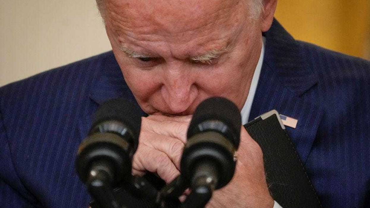 U.S. President Joe Biden pauses while listening to a question from a reporter about the situation in Afghanistan in the East Room of the White House on August 26, 2021 in Washington, DC. (Photo by Drew Angerer/Getty Images)