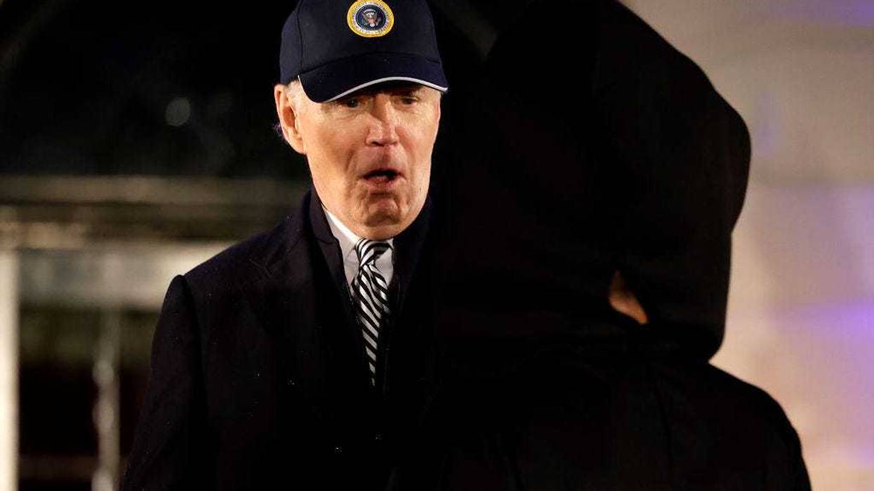 U.S. President Joe Biden reacts to a child's Halloween costume during a trick-or-treat event on the South Lawn of the White House on October 30, 2023 in Washington, DC.