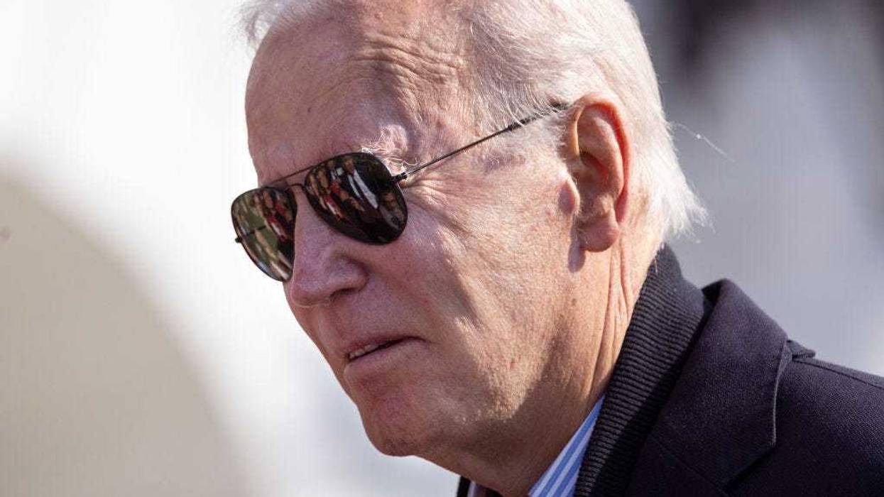 U.S. President Joe Biden speaks to the media as he departs on the South Lawn of the White House on October 12, 2022 in Washington, DC.