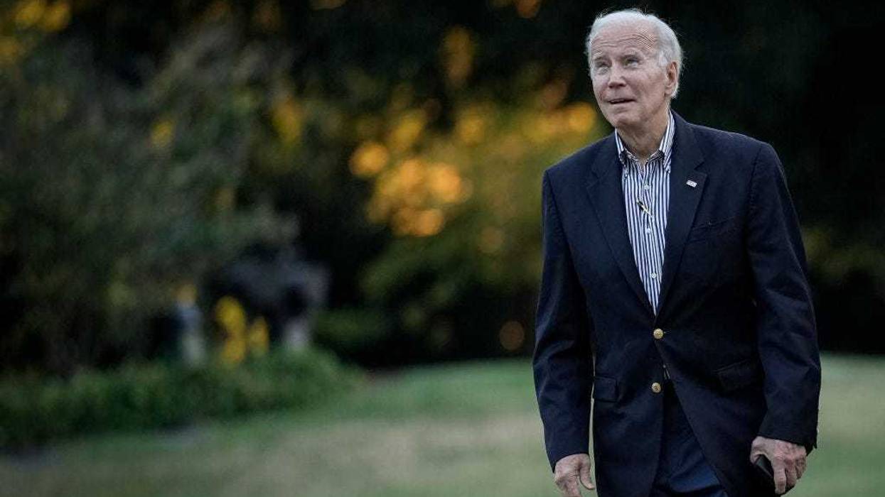 U.S. President Joe Biden walks toward the White House residence on the South Lawn after returning on Marine One October 5, 2022 in Washington, DC.