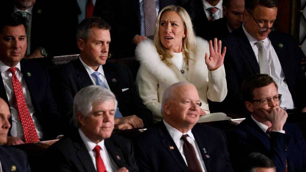 U.S. Rep. Marjorie Taylor Greene (R-GA) (C) reacts during President Joe Biden's State of the Union address during a joint meeting of Congress in the House Chamber of the U.S. Capitol on February 07, 2023 in Washington, DC. The speech marks Biden's first address to the new Republican-controlled House. (Photo by Chip Somodevilla/Getty Images)