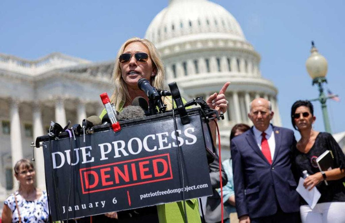 U.S. Rep. Marjorie Taylor Greene (R-GA), joined by lawmakers and family members of January 6th insurrectionist prisoners, speaks during a press conference on the House January 6 Committee hearings at the U.S. Capitol on June 15, 2022 in Washington, DC. Greene and other lawmakers spoke out against the Committee investigating the January 6 attack on the U.S. Capitol and the conditions of the D.C. jail where many prisoners arrested in connection to the attack are being held. (Photo by Kevin Dietsch/Getty Images)