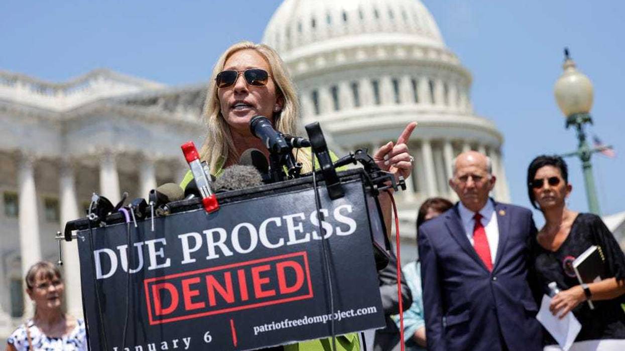 U.S. Rep. Marjorie Taylor Greene (R-GA), joined by lawmakers and family members of January 6th insurrectionist prisoners, speaks during a press conference on the House January 6 Committee hearings at the U.S. Capitol on June 15, 2022 in Washington, DC. Greene and other lawmakers spoke out against the Committee investigating the January 6 attack on the U.S. Capitol and the conditions of the D.C. jail where many prisoners arrested in connection to the attack are being held. (Photo by Kevin Dietsch/Getty Images)