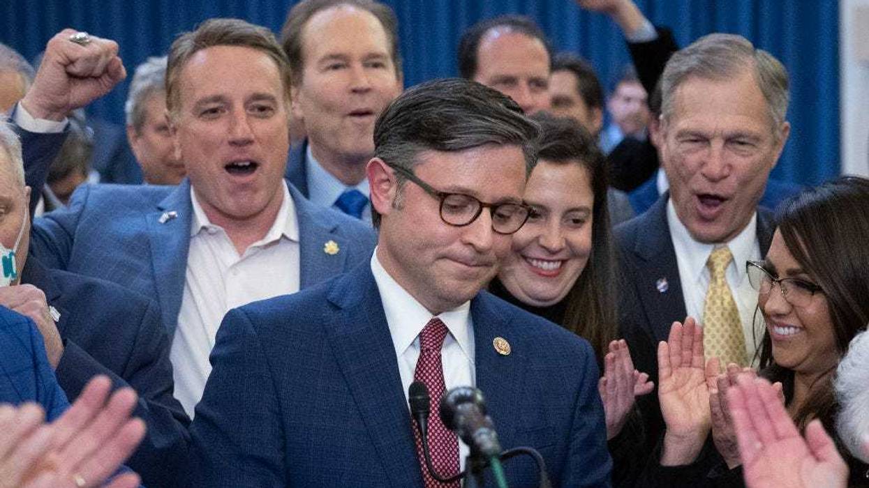 U.S. Rep. Mike Johnson (R-LA) surrounded by cheering House Republicans speaks after being elected as the speaker nominee during a GOP conference meeting in the Longworth House Office Building on Capitol Hill on October 24, 2023 in Washington, DC.