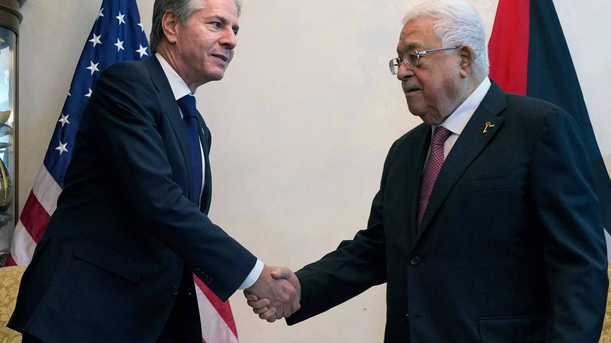 U.S. Secretary of State Antony Blinken shakes hands with Palestinian President Mahmoud Abbas