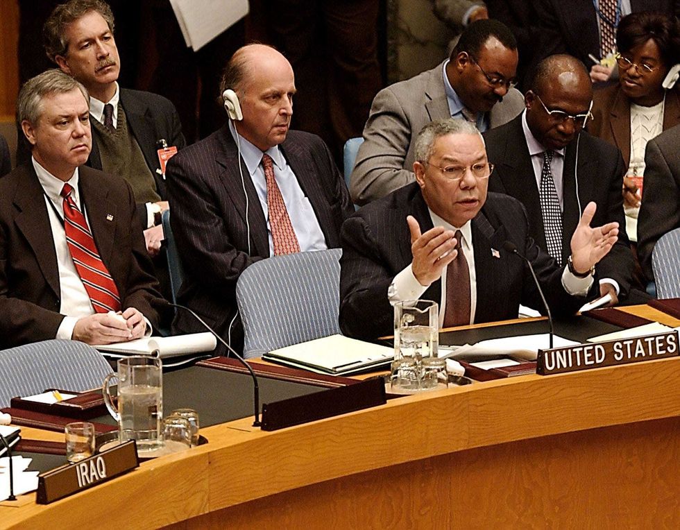 U.S. Secretary of State Colin Powell (R) addresses the Security Council February 14, 2003 at United Nations headquarters in New York City