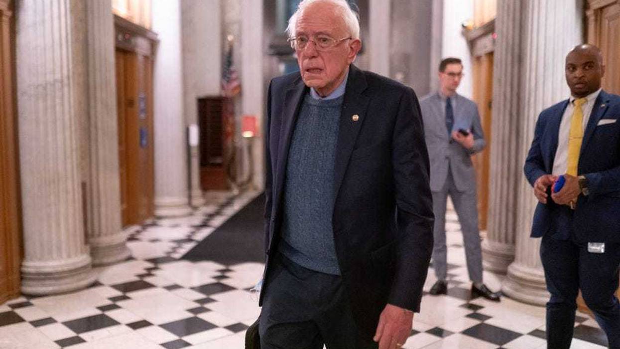 U.S. Sen. Bernie Sanders (R) (I-VT) walks toward the Senate Chambers on March 23, 2024 in Washington, DC. The House of Representatives passed a $1.2 trillion spending bill to fund the government through September and avert a partial shutdown. The legislation will now go to the Senate for consideration.