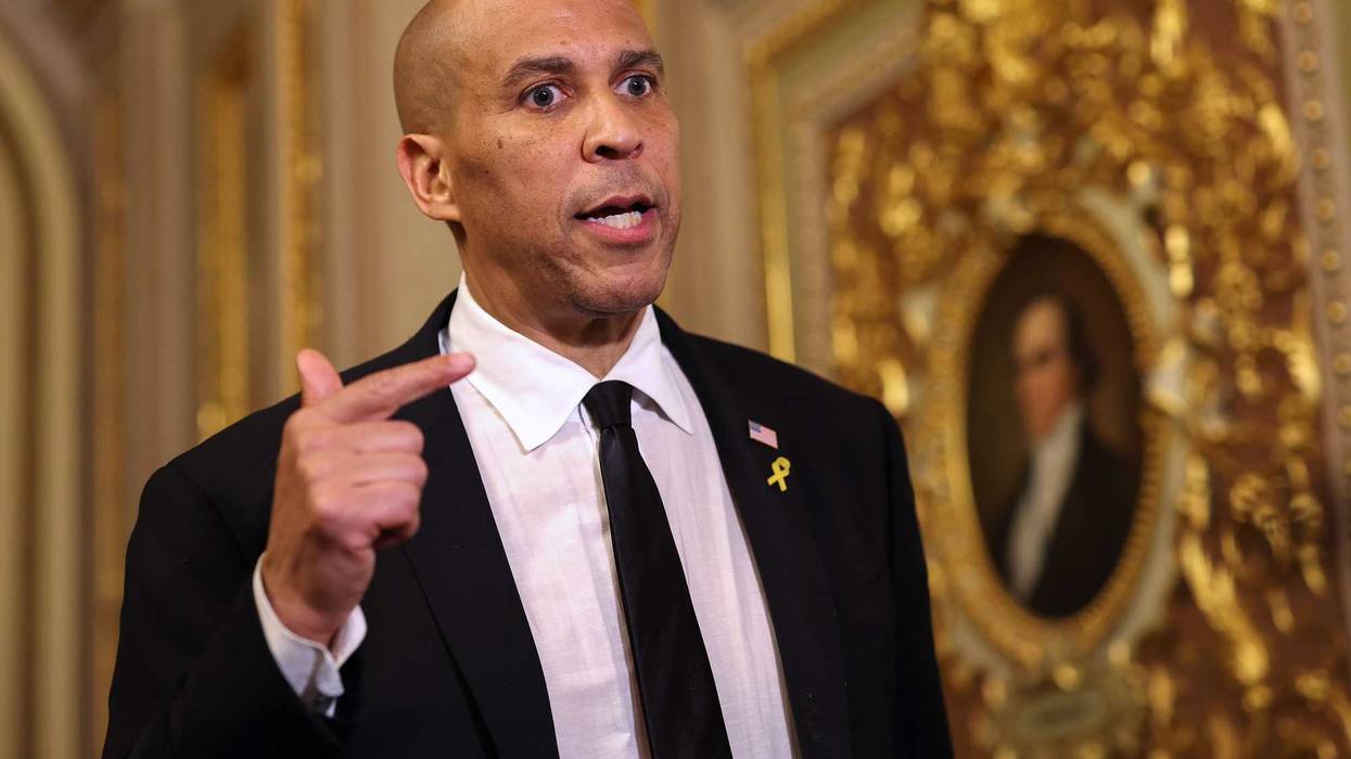 U.S. Sen. Cory Booker (D-NJ) speaks to reporters as he leaves the Senate Chamber after delivering a record setting floor speech at the U.S. Capitol on April 1, 2025