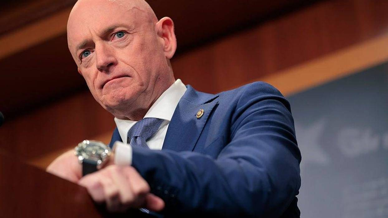 U.S. Sen. Mark Kelly (D-AZ) speaks on the failed grand jury indictment against him during a news conference at the U.S. Capitol on February 11, 2026 in Washington, DC. Kelly spoke on the recent failed Department of Justice grand jury indictment brought against him and other colleagues after they recorded a video citing the Uniform Code of Military Justice that members of the military must refuse illegal orders.