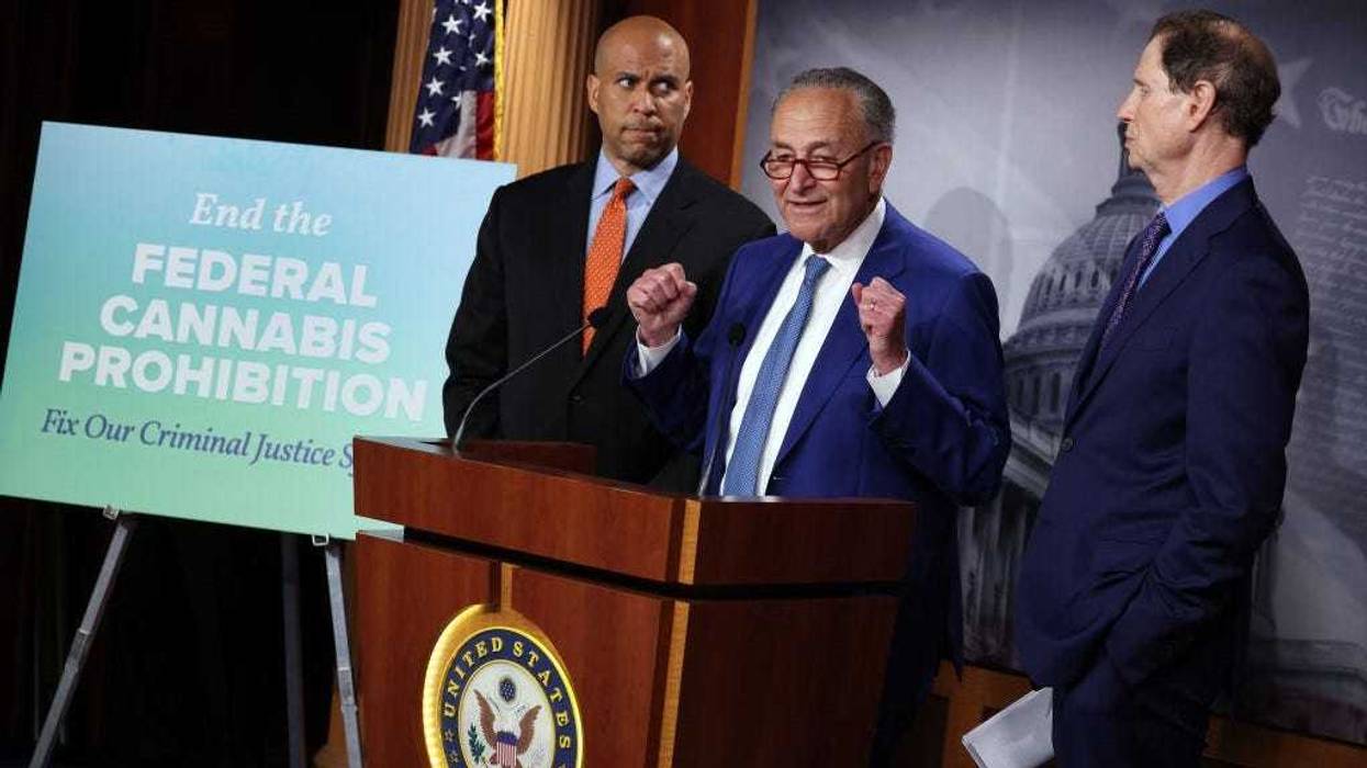 U.S. Senate Majority Leader Charles Schumer (D-NY) (C), joined by Sen. Cory Booker (D-NJ) (L) and Sen. Ron Wyden (D-OR), speaks at a press conference on introducing legislation to end federal cannabis prohibition at the U.S. Capitol on July 14, 2021 in Washington, DC.
