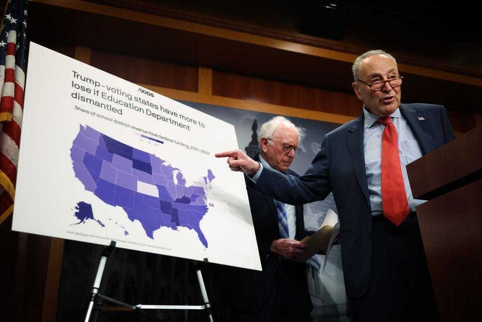 U.S. Senate Minority Leader Chuck Schumer (D-NY) (R) speaks to press alongside Sen. Bernie Sanders (I-VT) (L) in the U.S. Capitol on March 06, 2025 in Washington, DC. The Senators addressed Trump