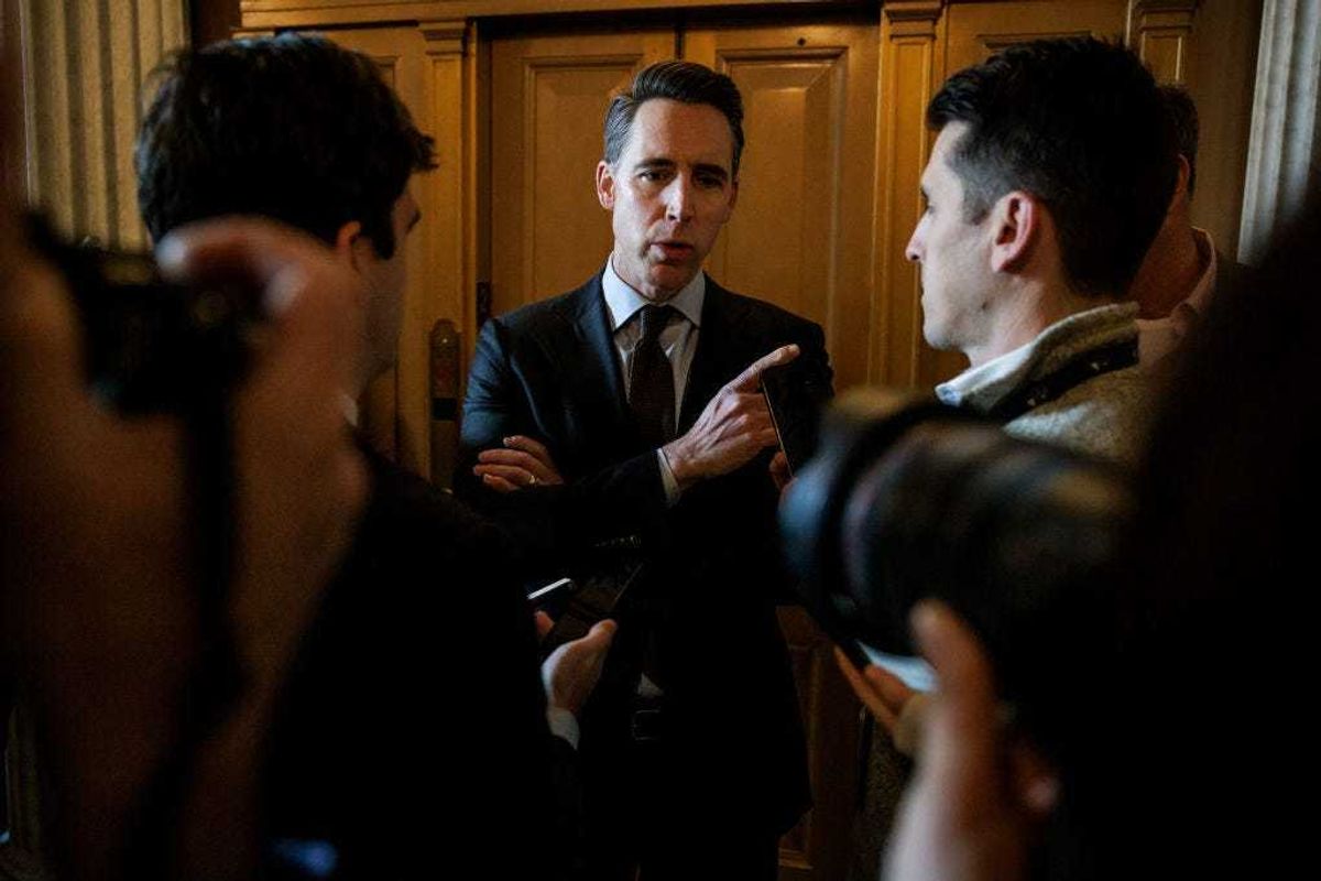 U.S. Senator Josh Hawley (R-MO) talks to reporters as he heads to the Senate floor for a vote on January 23, 2024 in Washington, DC. Negotiations over border security, military aid to Ukraine and Israel, and the government budget continue this week on Capitol Hill.