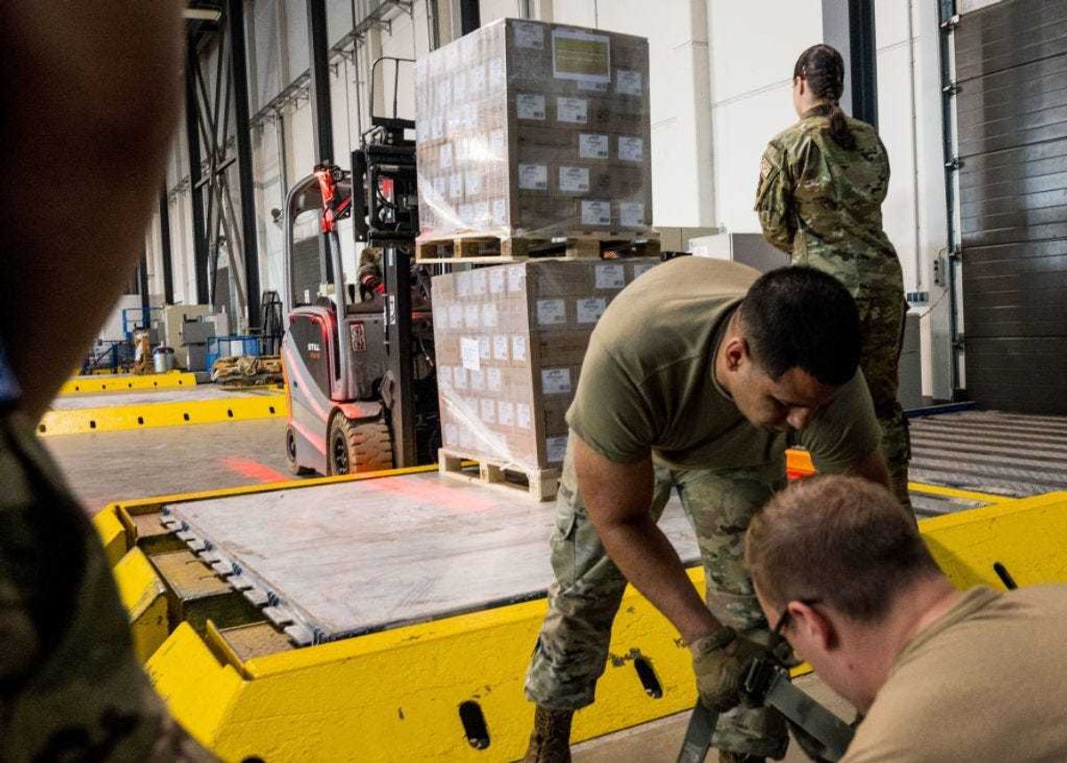 U.S. soldiers load pallets with baby formula arrived with three trucks from Switzerland for the United States at Ramstein American Air Force base on May 21, 2022 in Ramstein-Miesenbach, Germany. A total of 32500 KG will be flown to the USA tomorrow morning. The U.S. government has launched Operation Fly Formula, in which the Agriculture Department, the Department and the Department of Health and Human Services and the Pentagon are cooperating to find alternative sources of baby formula from abroad after Abbott Laboratories temporarily closed a Michigan manufacturing plant following possible contamination in February. The closing has resulted in a nationwide shortage of baby formula. (Photo by Thomas Lohnes/Getty Images)