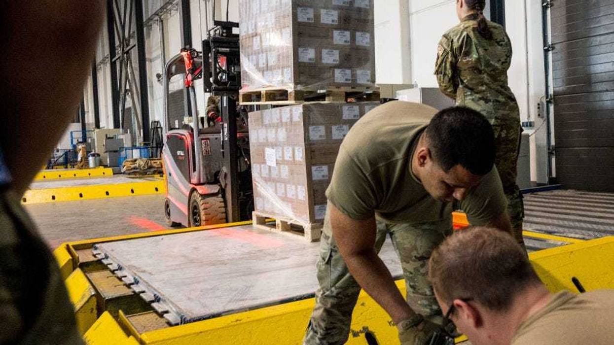 U.S. soldiers load pallets with baby formula arrived with three trucks from Switzerland for the United States at Ramstein American Air Force base on May 21, 2022 in Ramstein-Miesenbach, Germany. A total of 32500 KG will be flown to the USA tomorrow morning. The U.S. government has launched Operation Fly Formula, in which the Agriculture Department, the Department and the Department of Health and Human Services and the Pentagon are cooperating to find alternative sources of baby formula from abroad after Abbott Laboratories temporarily closed a Michigan manufacturing plant following possible contamination in February. The closing has resulted in a nationwide shortage of baby formula. (Photo by Thomas Lohnes/Getty Images)