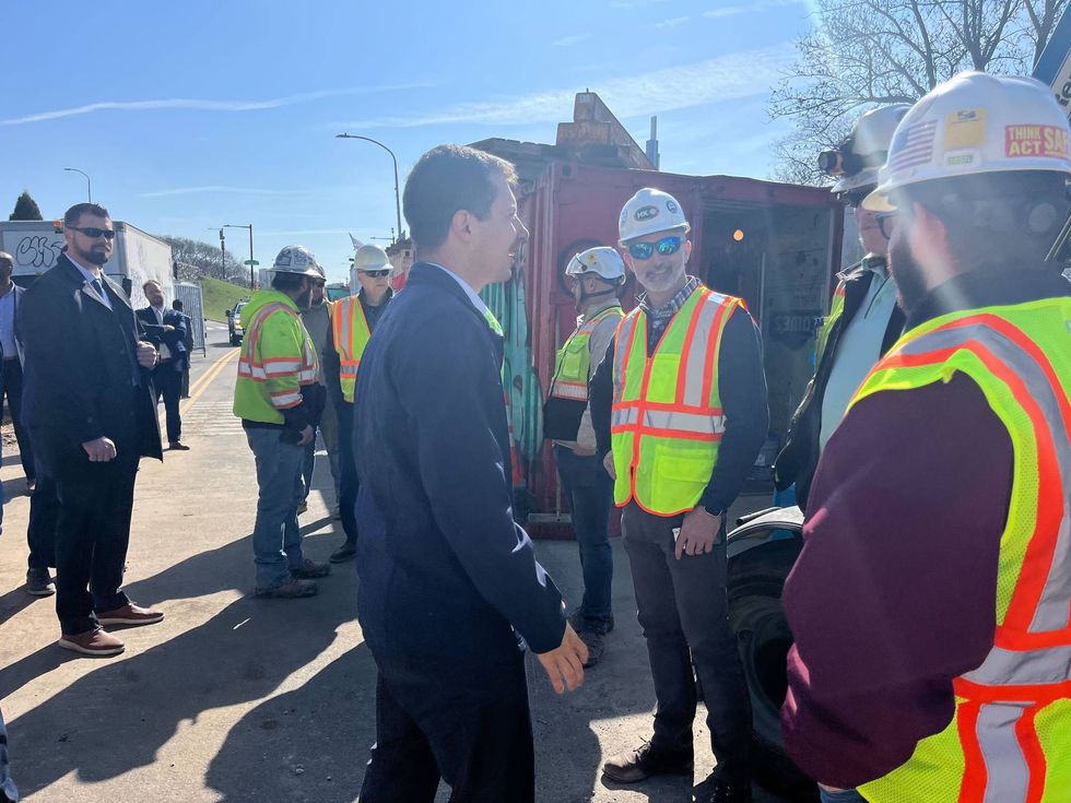 U.S. Transportation Secretary Pete Buttigieg meets members of the steelworkers union, who are working on the MLK Drive Bridge.